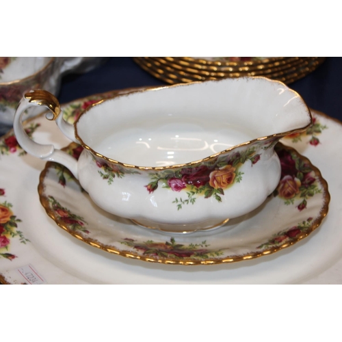 31 - Royal Albert Old Country Roses tea and dinner ware to include ashet, sauce boat, twin handled soup b... 