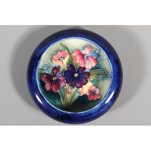 5 - Moorcroft floral pattern pin dish, 11cm diameter.&nbsp;