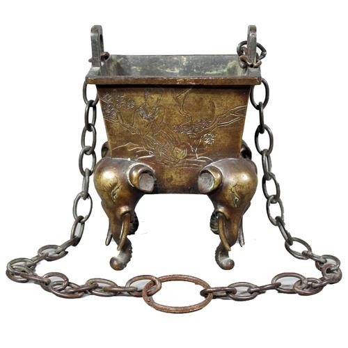 16 - Chinese bronze censer raised on four elephant supports, 14cm tall.