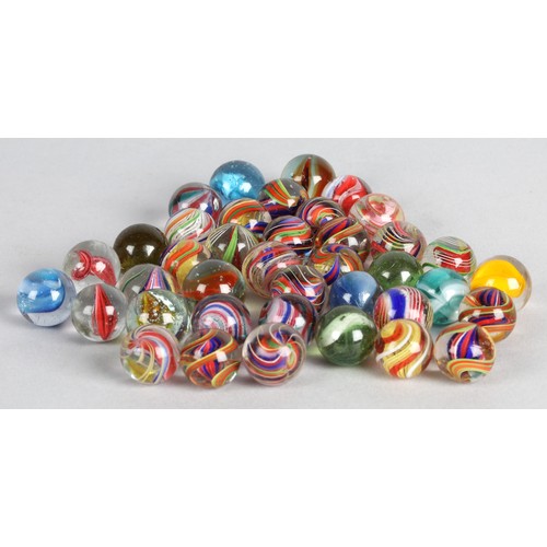 157 - Collection of antique marbles in a box, 'The Improved Game', and a related mahogany solitaire board.
