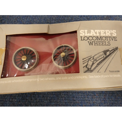 Plastic box containing loco wheels, track sleepers, buffers, figures ...