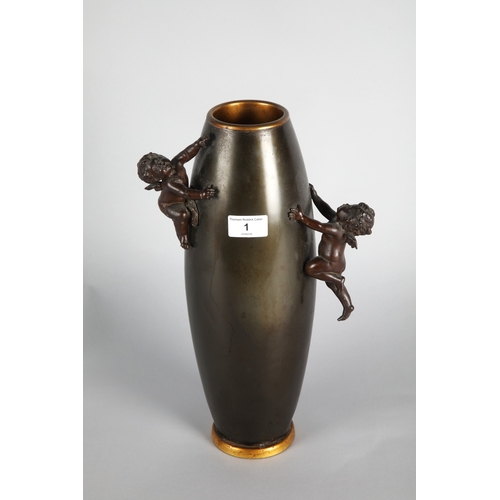 1 - Metal vase with climbing cherub handles, 37cm h.