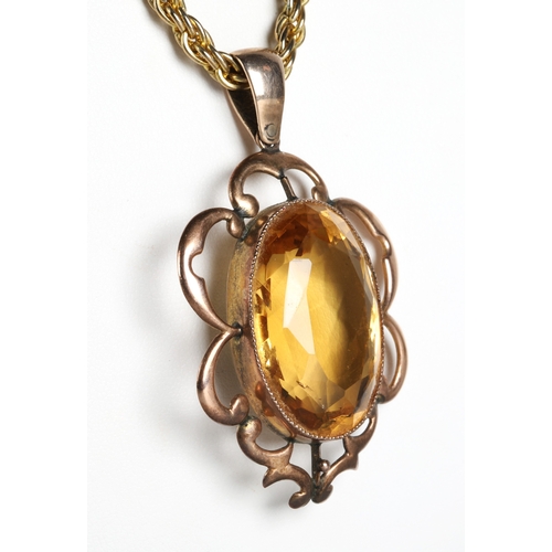 58 - 9ct gold pendant set with a large citrine on yellow metal chain.