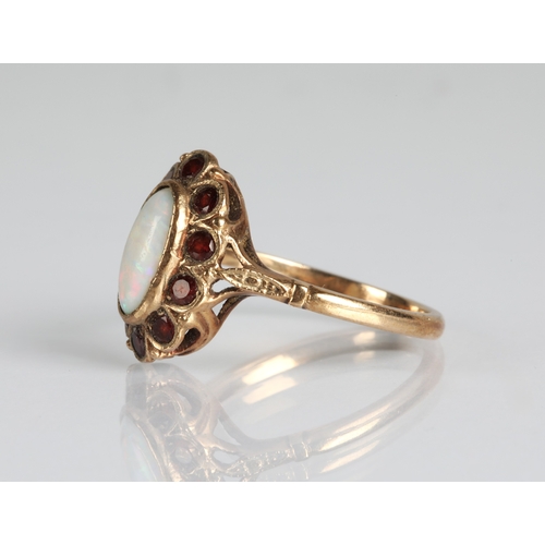 61 - 9ct gold opal and garnet dress ring, ring size P/Q, gross weight 3g.