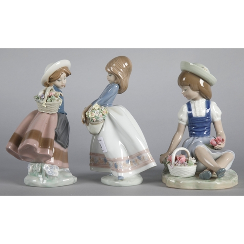 8 - Three Lladro figures to include 'May Flowers' 5467, 'Sweet Scent' 5221, and 'Picking Flowers' 1287 (... 