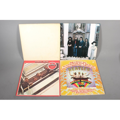 554 - Beatles vinyl records to include Hey Jude UK export cover, Magical Mystery Tour with 24 page colour ... 