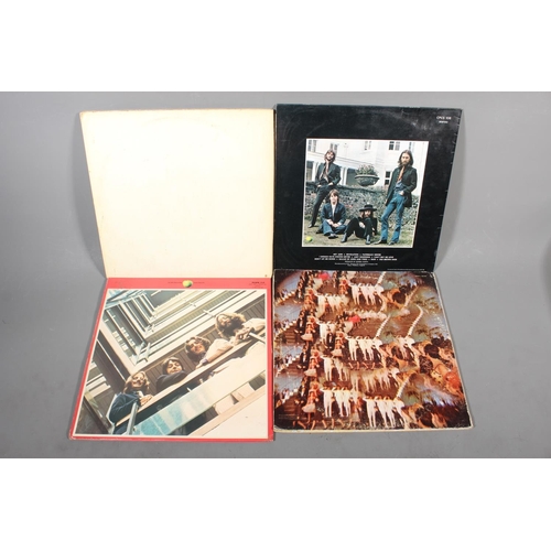 554 - Beatles vinyl records to include Hey Jude UK export cover, Magical Mystery Tour with 24 page colour ... 