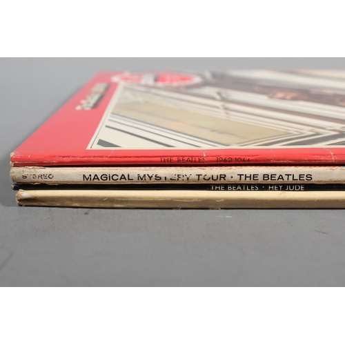 554 - Beatles vinyl records to include Hey Jude UK export cover, Magical Mystery Tour with 24 page colour ... 