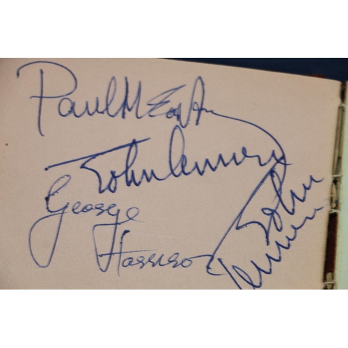757 - Small autograph book containing Beatles signatures to include John Lennon, Paul McCartney, George Ha... 
