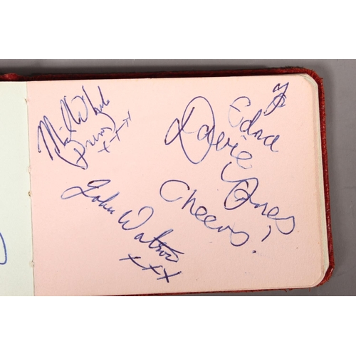 757 - Small autograph book containing Beatles signatures to include John Lennon, Paul McCartney, George Ha... 