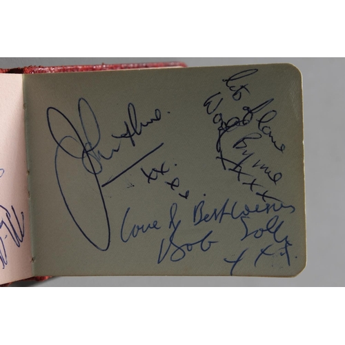 757 - Small autograph book containing Beatles signatures to include John Lennon, Paul McCartney, George Ha... 