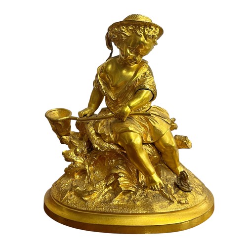 37 - Ormolu figure of a fishing boy, 17cm h.