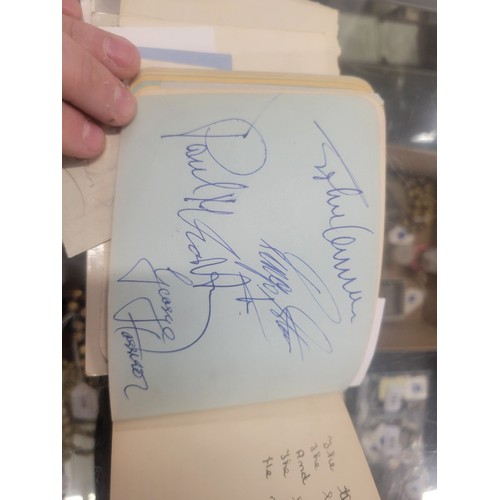 756 - Autograph book containing signatures from mainly the 1960's to include The Beatles, Sydney Devine, J... 