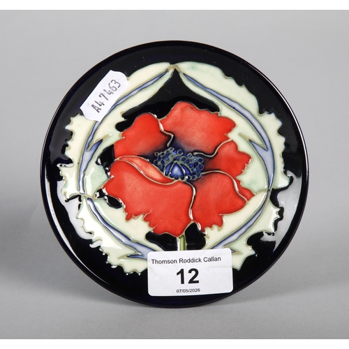 12 - Moorcroft Pottery Poppy patterned pin dish, diameter 12cm.