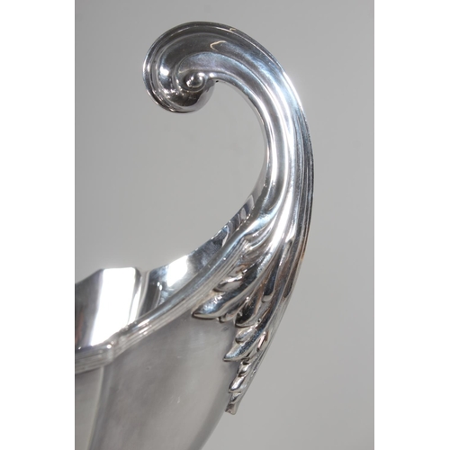1 - Edwardian silver centrepiece with boat shaped bowl having acanthus leaf scroll handles and raised on... 
