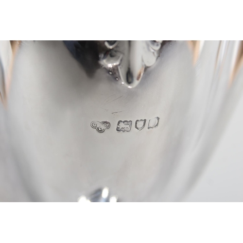 1 - Edwardian silver centrepiece with boat shaped bowl having acanthus leaf scroll handles and raised on... 