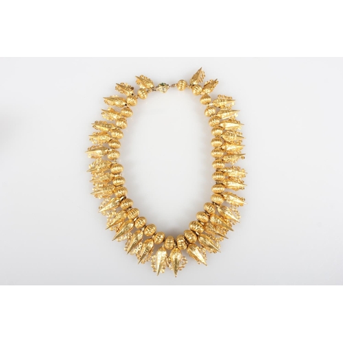 148 - Eastern high carat gold fringe collar formed of alternating pumpkin shaped and faceted cone drops wi... 