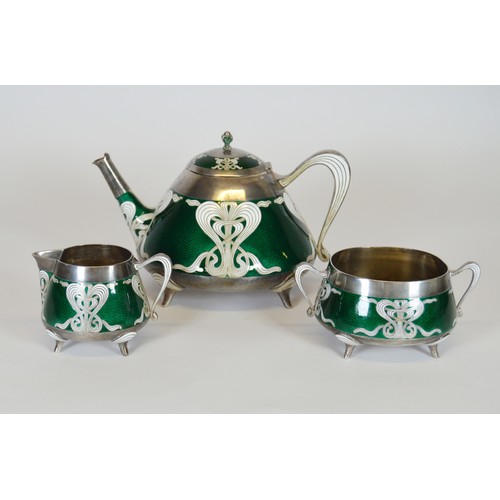 221 - Marius Hammer (Bergen, 1847-1927)Japanese influenced silver, ginbari cloisonné and enamel three-piec... 