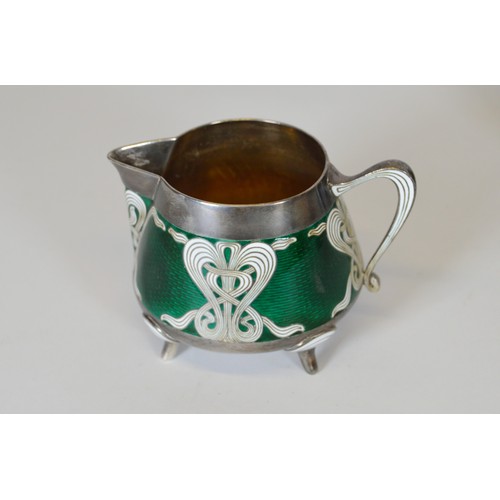 221 - Marius Hammer (Bergen, 1847-1927)Japanese influenced silver, ginbari cloisonné and enamel three-piec... 