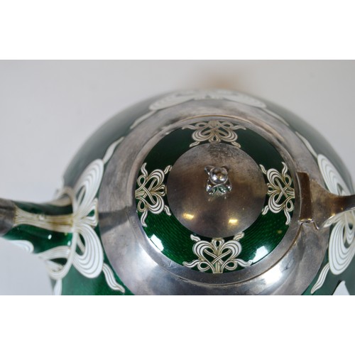 221 - Marius Hammer (Bergen, 1847-1927)Japanese influenced silver, ginbari cloisonné and enamel three-piec... 