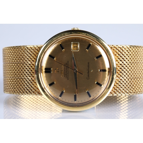 133 - 18ct gold gents Omega automatic constellation wristwatch, gold coloured dial with hour marker batons... 