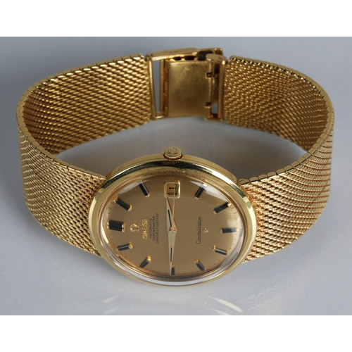 133 - 18ct gold gents Omega automatic constellation wristwatch, gold coloured dial with hour marker batons... 