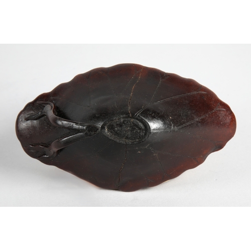 175 - 18th century Rhinoceros horn libation cup in the form of a lotus leaf. The cup has been split and re... 