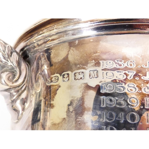 104 - Silver cup and cover, The Melvin Trophy presented by Sir Martin Melvin Bart., of early Georgian styl... 