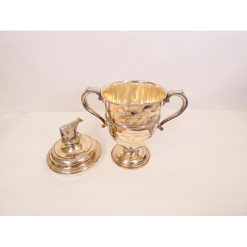 104 - Silver cup and cover, The Melvin Trophy presented by Sir Martin Melvin Bart., of early Georgian styl... 