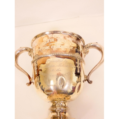 104 - Silver cup and cover, The Melvin Trophy presented by Sir Martin Melvin Bart., of early Georgian styl... 