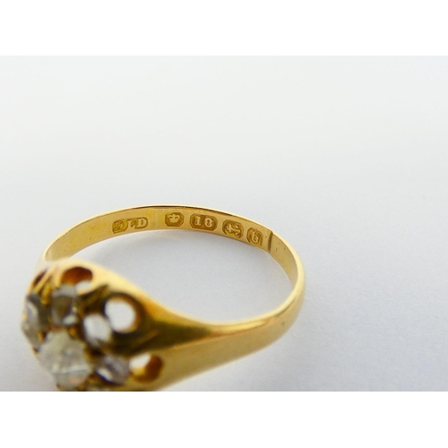 8 - Rose diamond seven stone cluster ring in 18ct gold, Birmingham 1876, 2.6g, size 'M'
