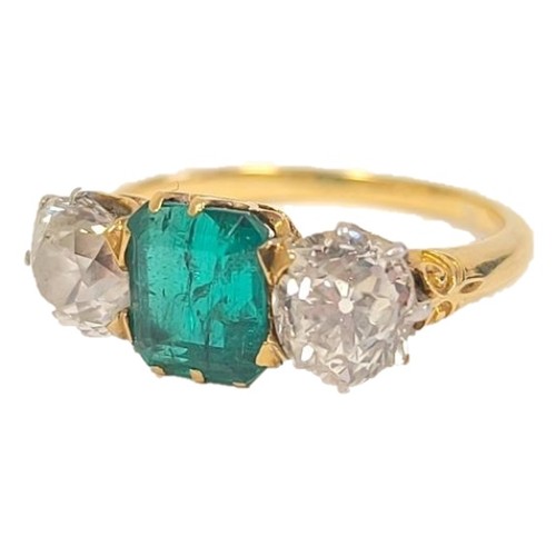 Diamond and emerald three stone ring with rectangular emerald of good colour 6x8 mm approximately 5mm and cut brilliants approximately 1ct each inscribed and dated 1900, size L½