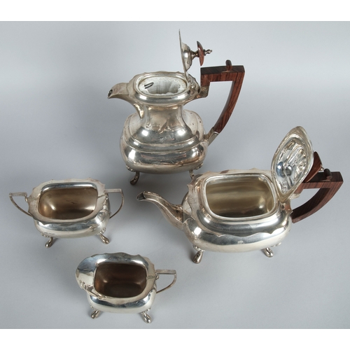 168 - Four piece silver tea service Sheffield 1923 maker Walker & Hall comprising of hot water pot, te... 