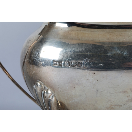168 - Four piece silver tea service Sheffield 1923 maker Walker & Hall comprising of hot water pot, te... 