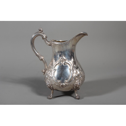 82 - Victorian silver four piece tea service having all over repousse floral, Rococo scroll and green man... 