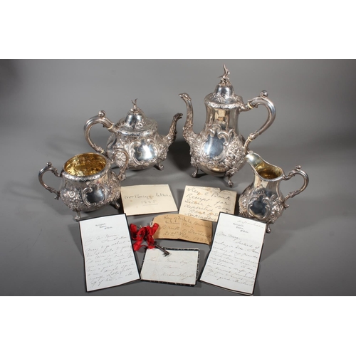 82 - Victorian silver four piece tea service having all over repousse floral, Rococo scroll and green man... 
