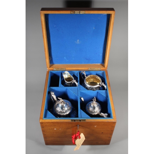 82 - Victorian silver four piece tea service having all over repousse floral, Rococo scroll and green man... 