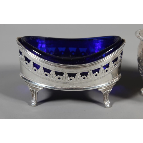 83 - Georgian silver table salt of navette shape having pierced border and raised on four fluted scroll s... 