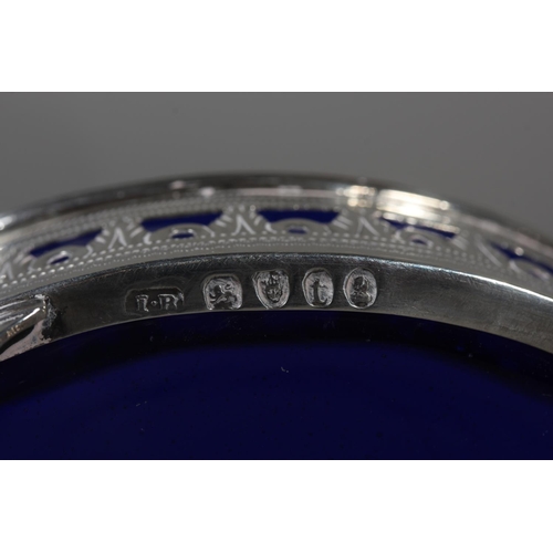 83 - Georgian silver table salt of navette shape having pierced border and raised on four fluted scroll s... 