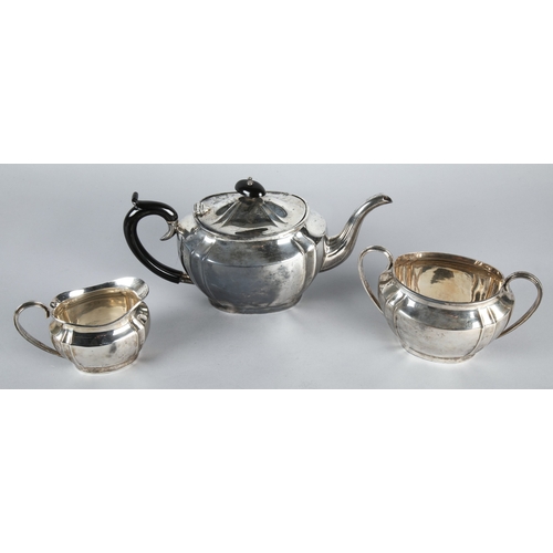 242 - Silver three piece tea service comprising of a teapot, cream jug, and sugar bowl, William Adams Ltd,... 