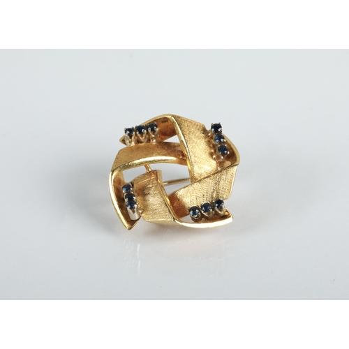 94 - Ladies 18ct yellow gold brooch set with four groups of three small sapphires, 2cm diameter, gross we... 