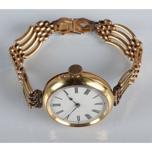 99 - 18ct yellow gold wristwatch white enamelled dial (cracked) with roman numerals, , gross weight 45g.