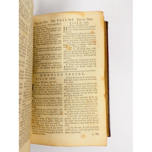 99 - The Book of Common Prayer.&nbsp;18th century red morocco, much foxing & spotting. Edinburgh, 177... 