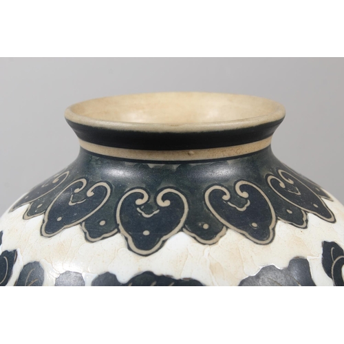 265 - Chinese Cizhou style sgraffito peony vase, 21cm high.