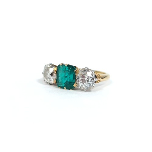 Diamond and emerald three stone ring with rectangular emerald of good colour 6x8 mm approximately 6mm and cut brilliants approximately 1ct each inscribed and dated 1900, size L½ 4.5g