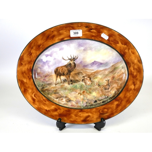 309 - Shirley Berrow signed handpainted porcelain oval serving plate, decorated with stag and deer in land... 