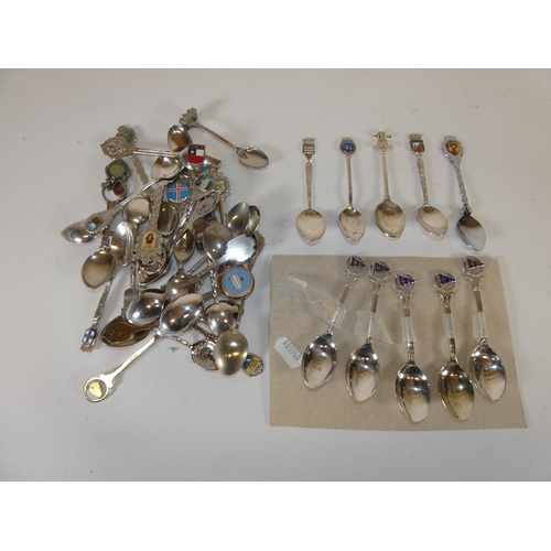 314 - Collection of silver plated souvenir spoons, and two silver souvenir spoons, with various surmounts.