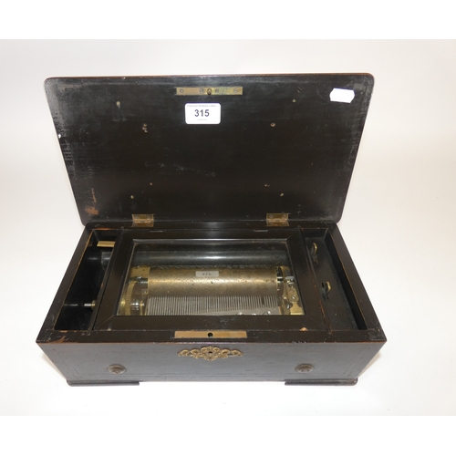 315 - Swiss late 19th century ebonised music box, with single cylinder.