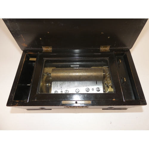 315 - Swiss late 19th century ebonised music box, with single cylinder.
