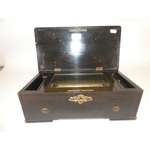 315 - Swiss late 19th century ebonised music box, with single cylinder.